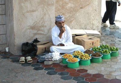 Street vendor lost in thought