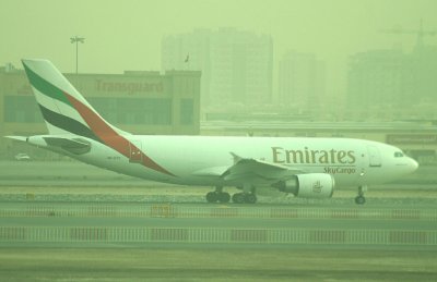 Emirates cargo A-310 in the morning haze, DXB, Feb 2008