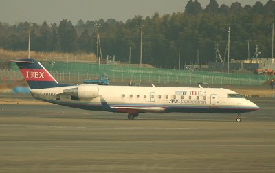 Small CRJ in NRT, the world of widebodies