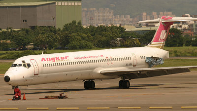 An engine-less Angkor Airways MD-80 parked at TPE