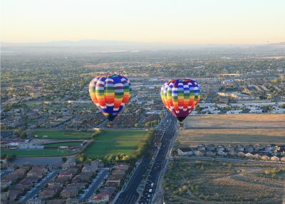2 balloons over the city.
