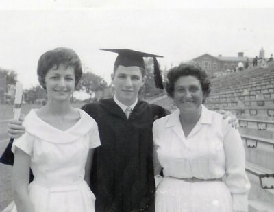 Gene graduates from Coolidge High in 1960 (shown with Carol & Janet)