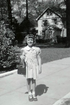 Young Carol looks very sweet with her purse!