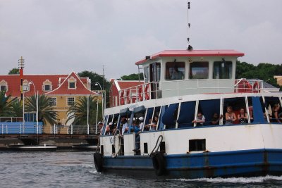 When the pontoon bridge swings open, a free ferry takes passengers across St. Annabaai from Punda to Otrobanda and vice versa