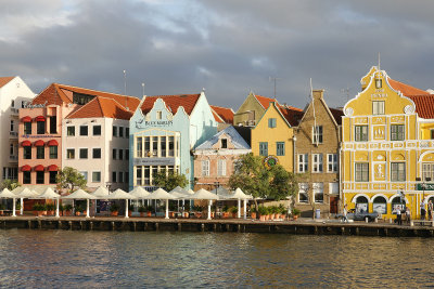 Willemstad has 2 parts (this is Punda), separated by water & connected by the Queen Emma Pontoon Bridge.