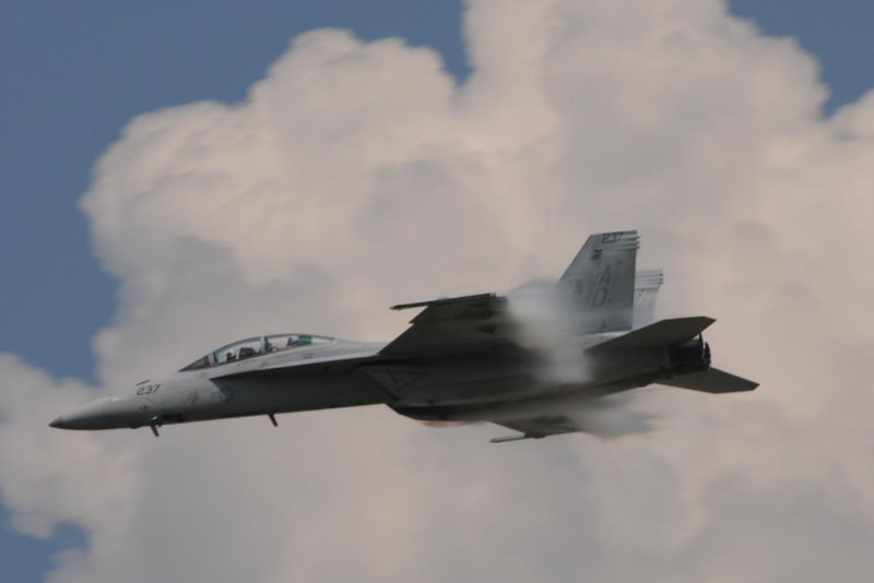 FA-18 with condensation cloud