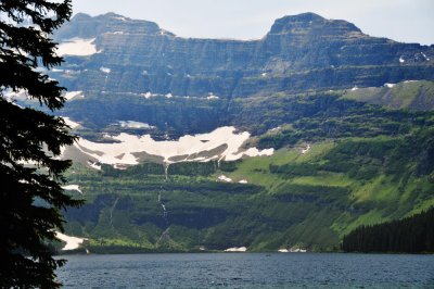 Cameron Lake. The far mountain is in the U.S.  Notice the canoe in the distance.