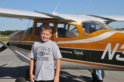Nolan with the Cessna Skyhawk that we just took our ride in