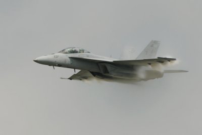 FA-18 with condensation cloud