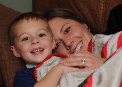 Camden and Mom snuggling on the couch
