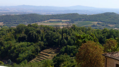 which overlooks the Tuscan landscape. It's worth getting a tan...