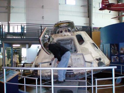 Leslie checking out the Apollo 7 capsule.  Can you imagine 3 people inside there?