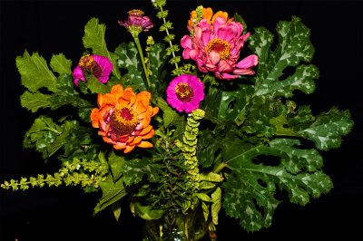 Falls last Garden Bouquet.  Zucchini leaves, rosemary, basil and zinnias,