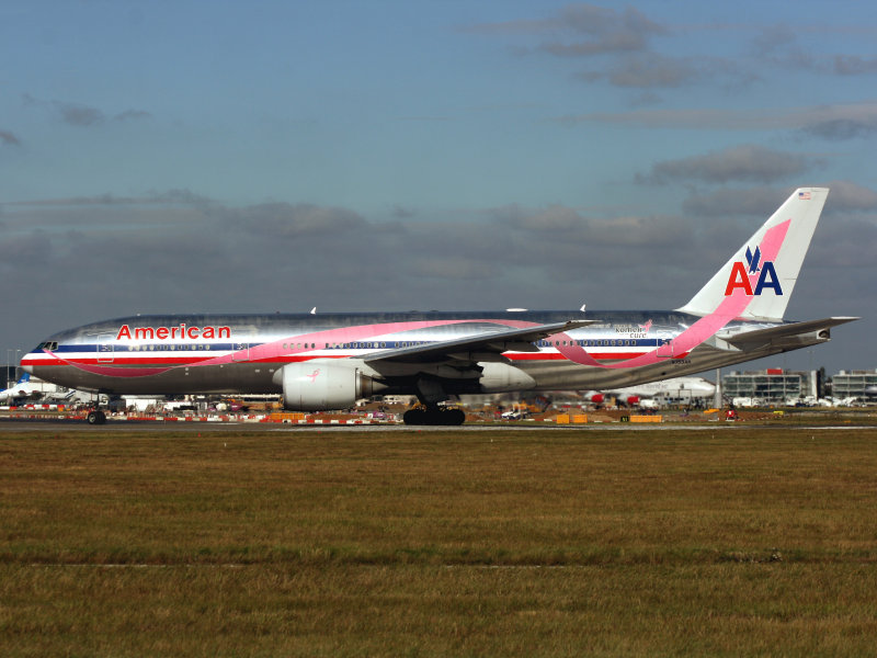 LHR 29-09-09 with the special pink ribbon scheme... rolling on 27L