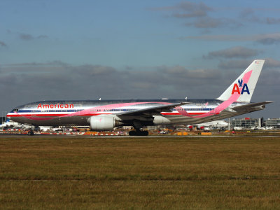 LHR 29-09-09 with the special pink ribbon scheme...  rolling on 27L   
