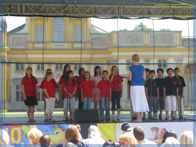 The American School singing on Children's Day