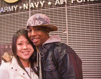 Times Sq couple by recruitment center