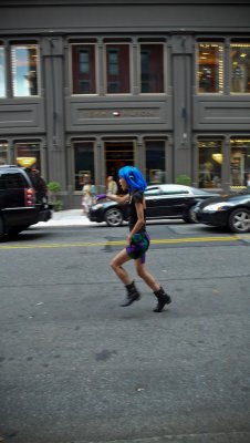Skipping in blue wig/Spring St..