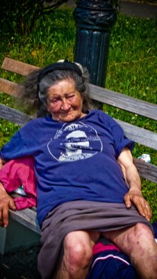 old woman taking the sun Riverside Pk.