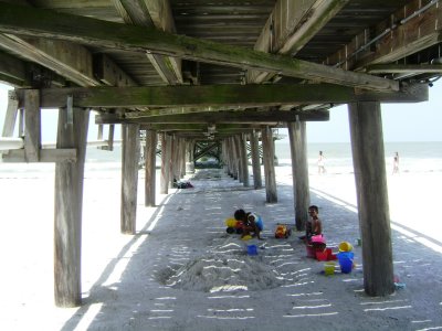 Some smart kids who found a place to play where the breeze is cooler and no risk of sunburn!  The heat & humidity were very high the day we were out & about (actually, EVERY day of our trip)!