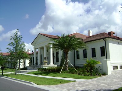 The front of that largest SENIOR single-story housing, with a detached 3-car garage.  The next photo shows a close-up of the front entrance.