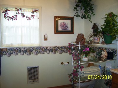 Remodeled yet again, after yet another flood from upstairs!!!  This was after that remodel, changing the wall color and wall paper border.