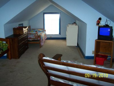 (This was the same view as previous, only showing it while grandkids lived in it and before we repainted the whole upstairs to very neutral colors and pulled out the temporary carpeting we had put in.)