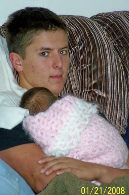 Our son Alex, holding his brand-new niece, Loreli, in one of my all-time favorite girl blankets.  It is SO incredibly soft to feel!