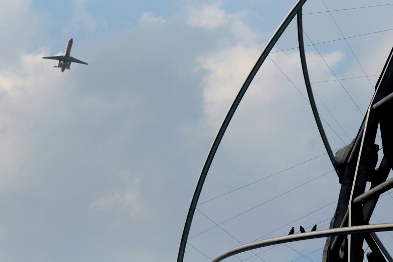 Airliner over the Unisphere, Flushing Meadow Park