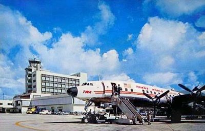 1959 - TWA Constellation on Concourse 3 at the new Miami International Airport terminal before the hotel was added to the roof