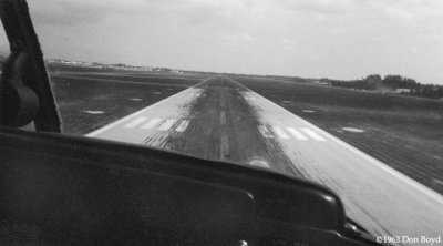 1962 - about to land on MIA's old short narrow runway 9-R in American Airtaxi Piper PA-28 N2194P