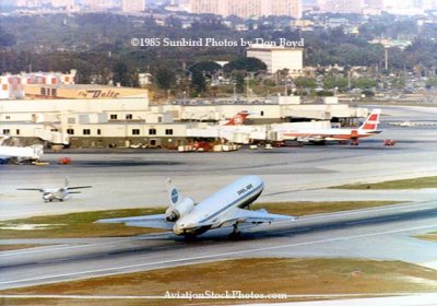 1983 - National Commuter Nord-262, Pan Am DC-10, Air Canada B727 and TWA B707 at Miami International Airport