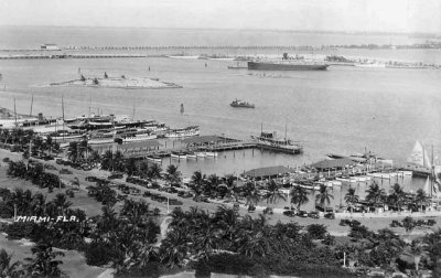 1935 - Bayfront Park, the Port of Miami, County Causeway, and Venetian Causeway with the Viking Airport hangar