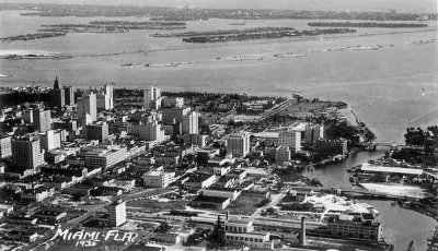 1935 - aerial of downtown Miami, entrance to the Miami River and Biscayne Bay