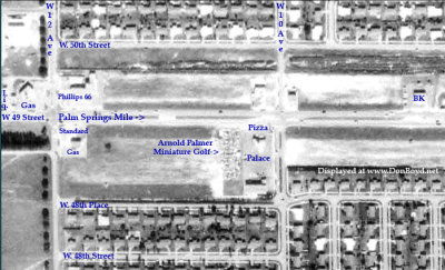1963 - aerial view of Palm Springs Mile east of W. 12th Avenue featuring the Pizza Palace and Arnold Palmer Miniature Golf