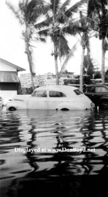 1947 - partially submerged vehicles in the Allapattah area after the Flood of 1947
