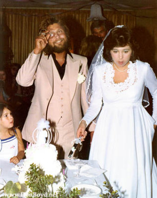 Terry and Susan Bocskey about to cut the wedding cake