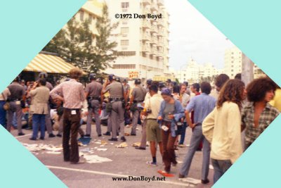 1972 - protesting hippies getting busted after trying to disable a bus on Collins Avenue on Miami Beach