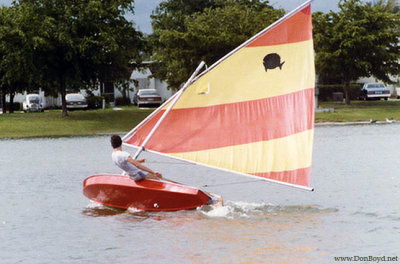 1979 - Bill Riggs sailing on Lake Suzie behind our homes