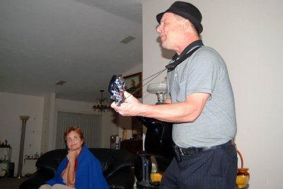 Alan providing the live entertainment as his wife Kathy looks on