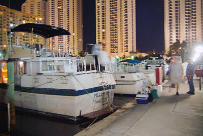 Several of the guys with Ron Urban's Miss Trish at Sunny Isles Beach (#1683)