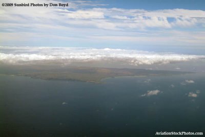 A view of Molokai while descending on Northwest flight 803 B747-451 N670US