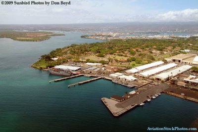 A view of Hickam Air Force Base in foreground and Pearl Harbor in background from Northwest flight 803 B747-451 N670US
