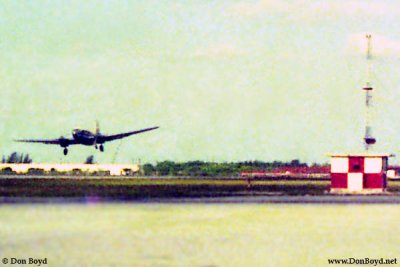1974 - an Air Haiti Curtiss C-46 Commando landing on MIA's 9-left