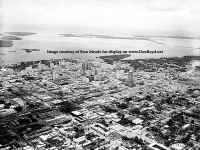 1950's - aerial view looking southeast over downtown Miami
