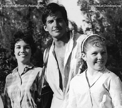 1961 - Sheila Poland, actor George Hamilton and Sheila's younger sister Linda Poland on the set of Angel Baby