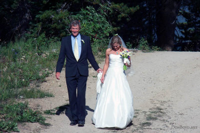 Erica's father, Tim Mueller, escorting her down the hill to the wedding (2666)