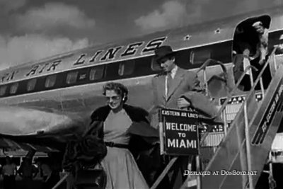 1954 - Jimmy Stewart and his wife Gloria arrive in Miami for world premiere of The Glenn Miller Story at 3 Miami theatres
