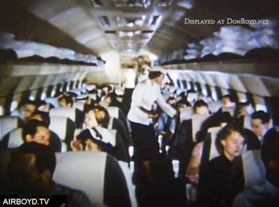 1953 - Eastern Air Lines stewardess providing inflight service on flight 601 Super Constellation service from Idlewild to Miami