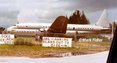 1970's - ex USN Lockheed XR6O-1 (R6V-1) Constitution N7673C on NW 135th Street, Opa-locka